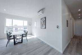 Los Angeles apartment for rent - a dining room with a table and chairs and a large window