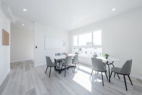 Los Angeles apartment for rent - a dining room with a table and chairs and a large window