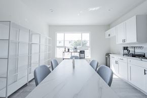 Los Angeles apartment for rent - a white kitchen with a white table and white cabinets