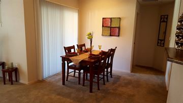 Glendale apartment for rent - a dining room with a table and chairs in a living room