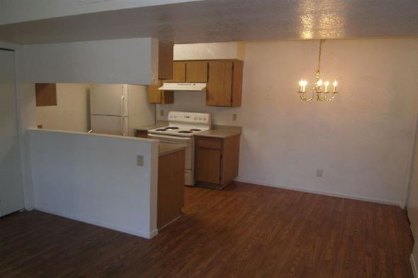 Phoenix apartment for rent - an empty kitchen with a stove and a refrigerator