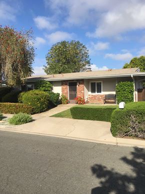Santa Barbara house for rent - A house with a red brick chimney and a mailbox on the front porch.