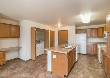 Dickinson apartment for rent - a kitchen with a counter top and a sink