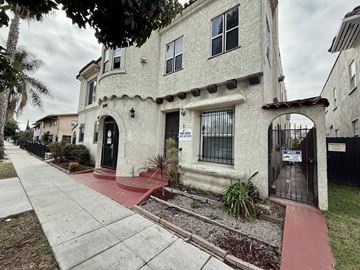 Long Beach apartment for rent - A house with a red walkway in front of it.