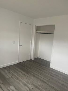 Vero Beach apartment for rent - A room with a white door and a grey floor.