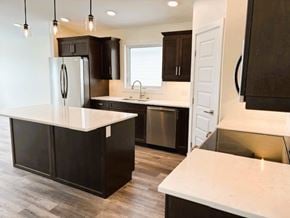 Brandon apartment for rent - A kitchen with a white countertop and black cabinets.
