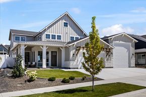 Boise house for rent - a white house with a sidewalk in front of it
