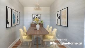 Vernon house for rent - a dining room with a wooden table and yellow chairs