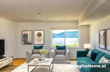 Vernon house for rent - an image of a living room with a couch and a table
