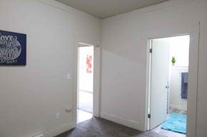 Spokane apartment for rent - A room with a sign that says "Love you to the moon and back" on the wall.