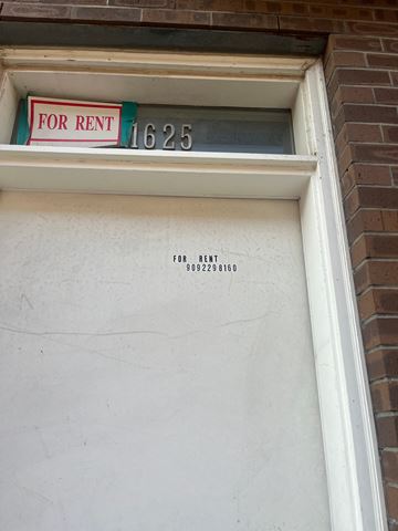 Philadelphia apartment for rent - a for rent sign on the front of a building
