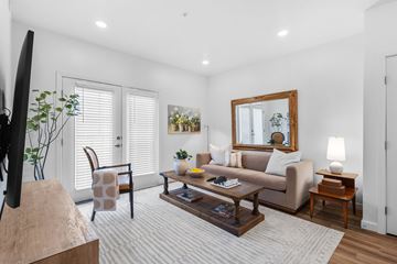 Idaho Falls apartment for rent - a living room with a couch and a coffee table