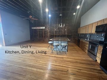 Grinnell apartment for rent - A kitchen, dining, and living area in Unit Y.
