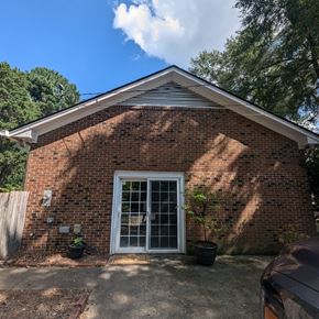 Cary apartment for rent - a brick house with a window and a driveway