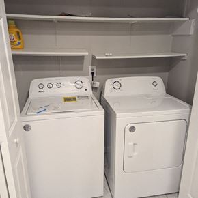Cary apartment for rent - a white washer and dryer in a closet