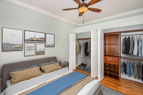 Tampa apartment for rent - a bedroom with a bed and a closet