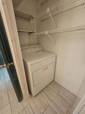 Pensacola house for rent - the laundry room is equipped with a washer and dryer