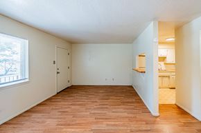 Albuquerque apartment for rent - A room with wooden flooring and white walls.