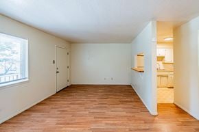 Albuquerque apartment for rent - A room with wooden flooring and white walls.