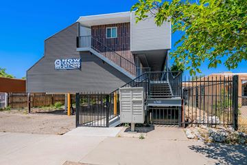 Albuquerque apartment for rent - A modern building with a staircase leading to the second floor.