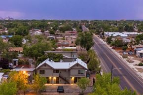 Albuquerque apartment for rent - A house with a car parked in front of it.