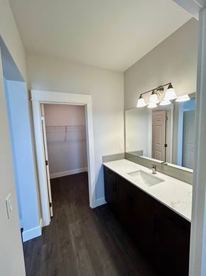 Bend apartment for rent - A bathroom with a sink and mirror.