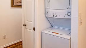Albuquerque apartment for rent - A white dryer is in a small room.