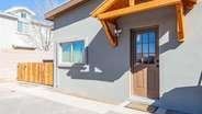 Albuquerque apartment for rent - A house with a brown door and a brown fence.