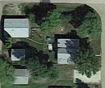 Manvel house for rent - an aerial view of a house and yard with trees and a pool