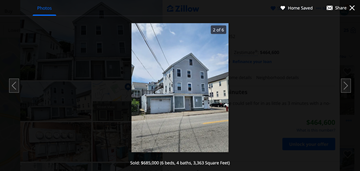 Lowell apartment for rent - a screenshot of a city street with a blue house and a house on the side