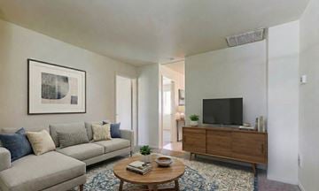 Edgewood apartment for rent - a living room with a couch and a coffee table