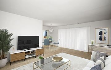 Baltimore apartment for rent - a living room with a couch and a television