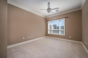 Murfreesboro apartment for rent - Empty room with a ceiling fan and a window.