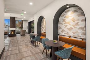 Seattle apartment for rent - A modern dining area with a table set for two.