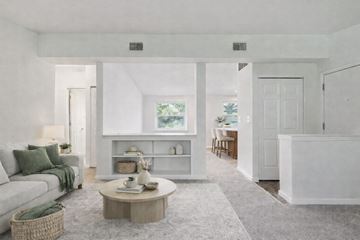 Baltimore apartment for rent - A living room with a grey couch and a brown coffee table.