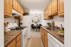 Windsor Mill apartment for rent - A modern bedroom with a large bed and a flat screen TV.