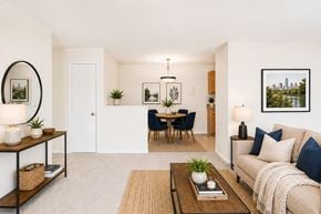Windsor Mill apartment for rent - A playground with a green slide and a wooden structure.