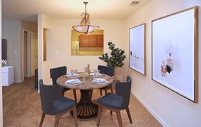 Hagerstown apartment for rent - A dining room with a round table set for six.