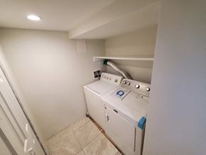 Washington house for rent - a laundry room with a washer and dryer in it
