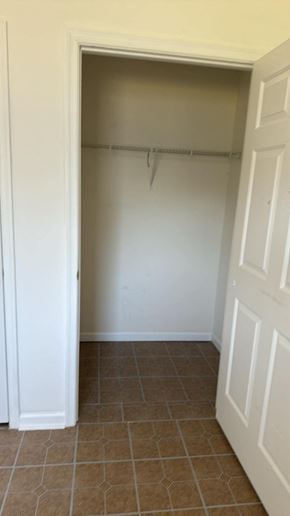 Pocomoke house for rent - an empty closet in a room with a door open