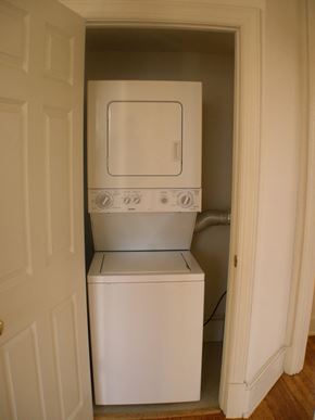 Washington apartment for rent - A white dishwasher and oven are in a small space.