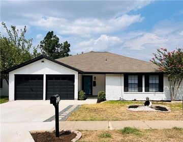 Austin house for rent - a house with a parking meter in front of it