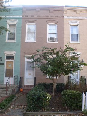 Washington apartment for rent - the front of a brick house with a white door
