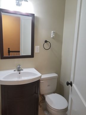 Washington apartment for rent - a small bathroom with a toilet and a sink