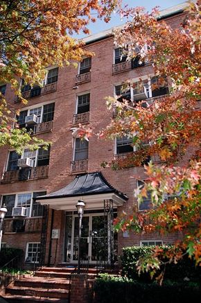 Washington apartment for rent - the front of a brick building with trees in front of it