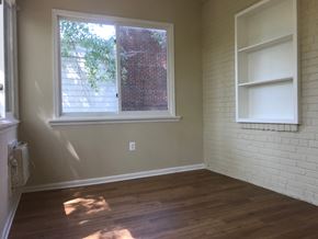 Washington apartment for rent - A room with a window and a white shelf on the wall.