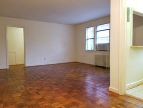 Washington apartment for rent - A room with wooden flooring and a window.