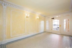 San Francisco apartment for rent - A room with a checkered floor and a door.