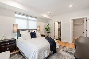 Newark apartment for rent - a bedroom with a bed and a closet