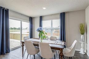 Waukee apartment for rent - A dining room with a table and chairs.
